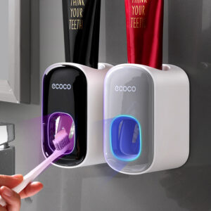 Wall-mounted automatic toothpaste holder featuring an adhesive mount, toothbrush storage, and upside-down mouthwash cup for hygiene and convenience.